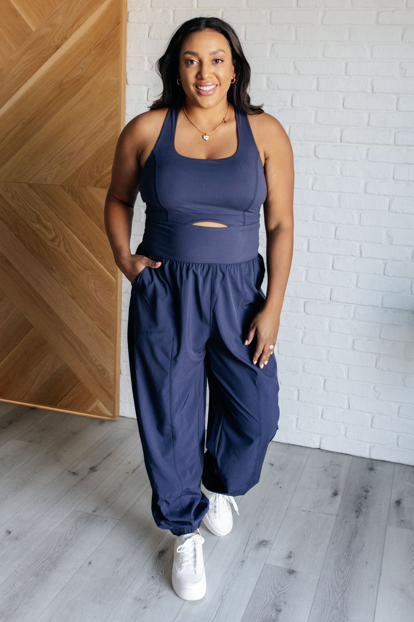 Raising Heart Rate Cut Out Jumpsuit in Navy|Corner Stone Spa Boutique-Athleisure- Corner Stone Spa and Salon Boutique in Stoughton, Wisconsin