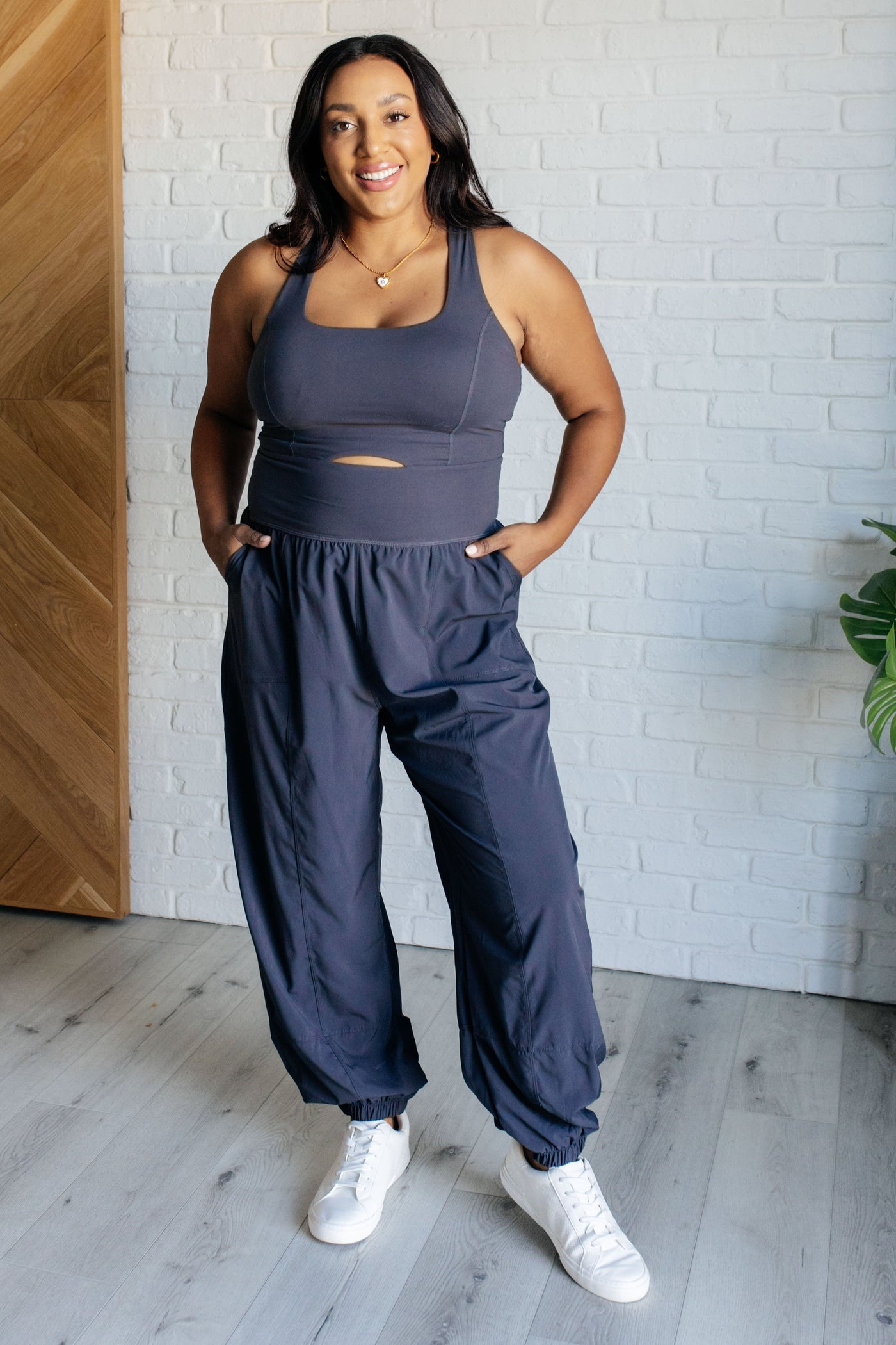 Raising Heart Rate Cutout Jumpsuit in Charcoal|Corner Stone Spa Boutique-Athleisure- Corner Stone Spa and Salon Boutique in Stoughton, Wisconsin